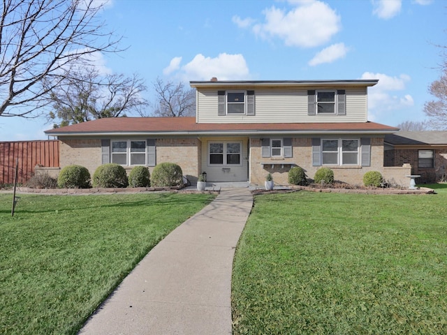 front facade with a front yard