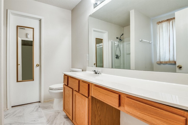 full bath with marble finish floor, toilet, vanity, a textured ceiling, and walk in shower