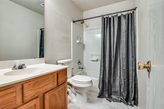 bathroom with toilet, shower / bath combo, a textured ceiling, and vanity