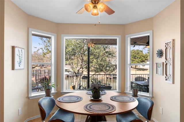 dining area with ceiling fan