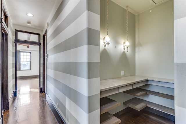 hallway with dark hardwood / wood-style flooring