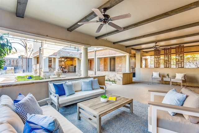 view of patio featuring an outdoor living space and ceiling fan