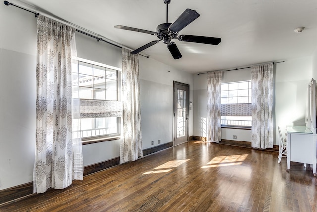 interior space featuring dark hardwood / wood-style floors and ceiling fan