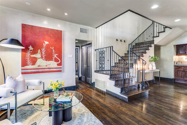 living room featuring dark hardwood / wood-style floors