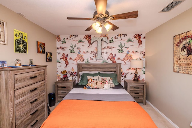 bedroom featuring ceiling fan and light colored carpet