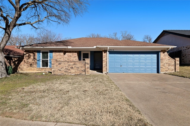 ranch-style house featuring a garage and a front lawn