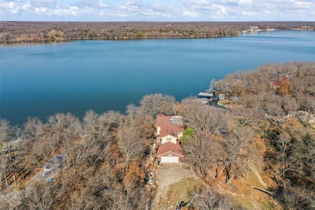 drone / aerial view with a water view