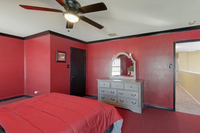 bedroom featuring light carpet, ornamental molding, and ceiling fan