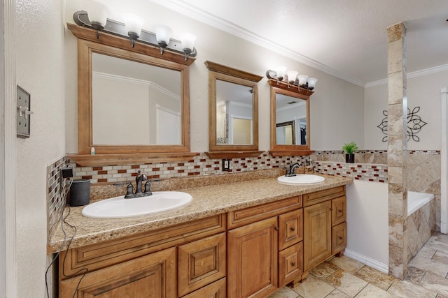 bathroom featuring decorative backsplash, ornamental molding, a bathing tub, and vanity