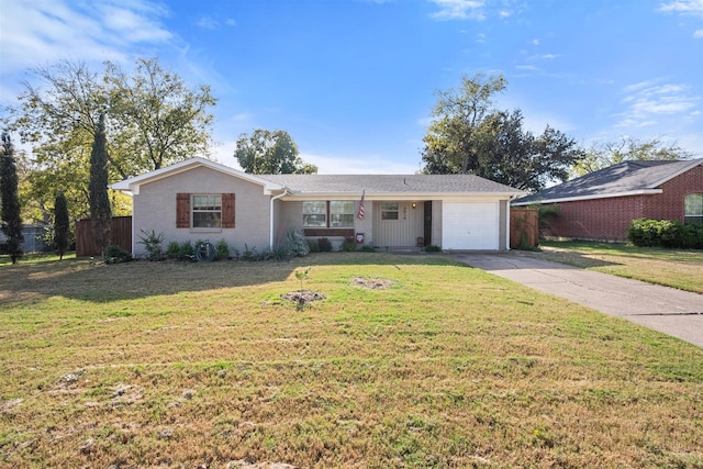 ranch-style house featuring a garage and a front lawn