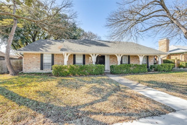 ranch-style house with a front yard