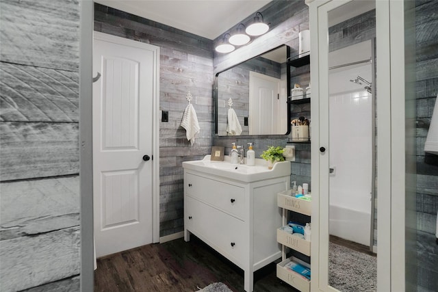 bathroom with vanity and hardwood / wood-style flooring