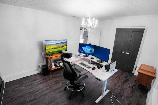 office space featuring dark hardwood / wood-style flooring, a textured ceiling, and an inviting chandelier