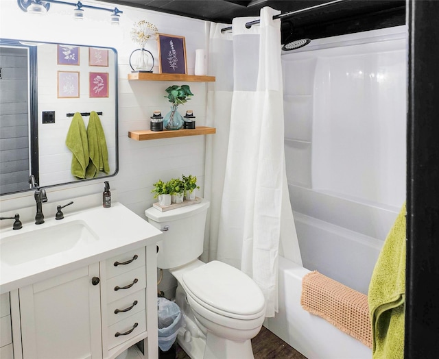 full bathroom with vanity, hardwood / wood-style flooring, toilet, and shower / bath combo with shower curtain