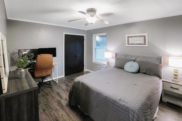 bedroom with dark wood-type flooring, ceiling fan, and ornamental molding