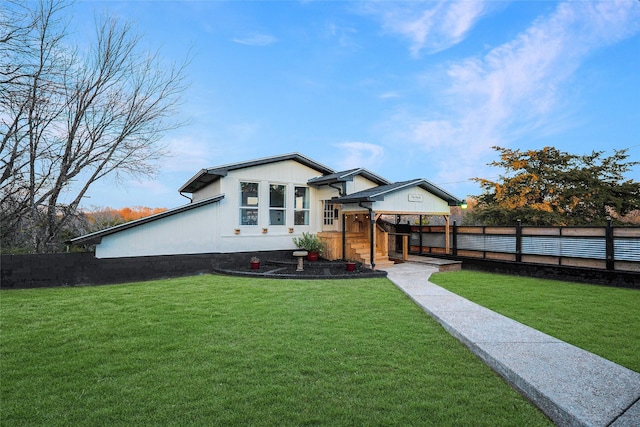 view of front of property with a front lawn