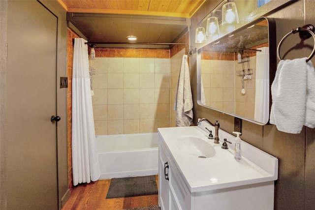 bathroom with hardwood / wood-style flooring, vanity, wooden ceiling, and shower / bath combination with curtain