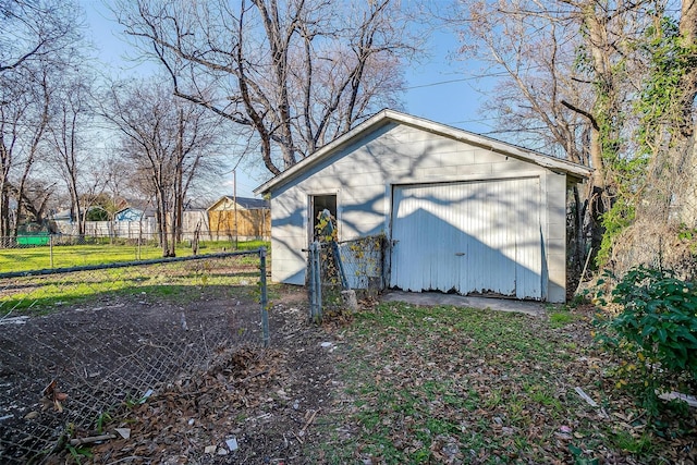 view of home's exterior featuring a garage and an outdoor structure