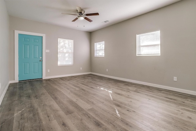 entryway with hardwood / wood-style flooring and ceiling fan