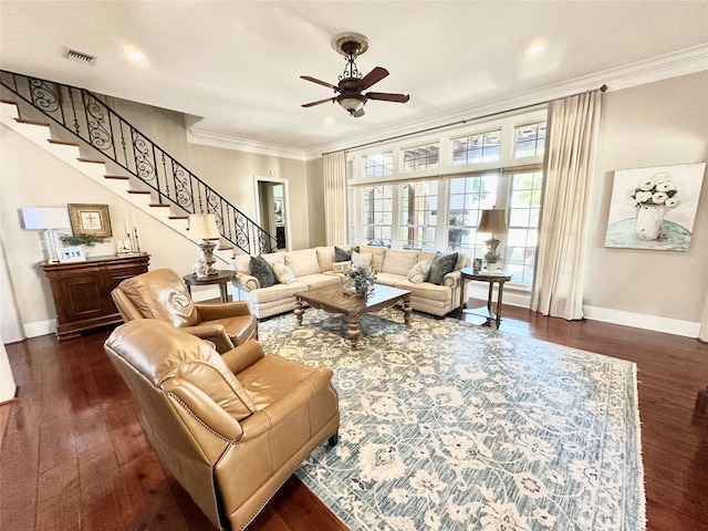 living room featuring ceiling fan, ornamental molding, and dark hardwood / wood-style flooring