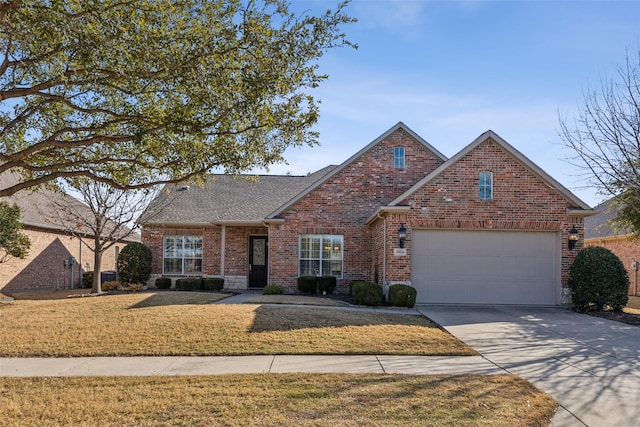 view of front property with a garage and a front yard