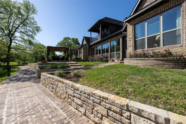 exterior space featuring a lawn