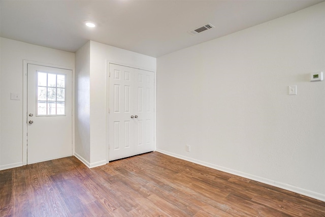 foyer with hardwood / wood-style flooring