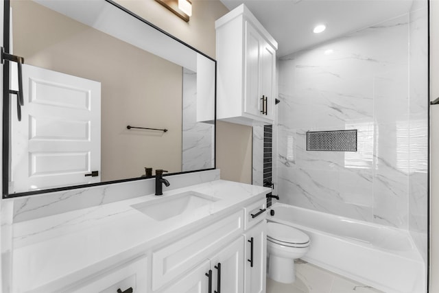 full bath with marble finish floor, recessed lighting, shower / bathing tub combination, toilet, and vanity