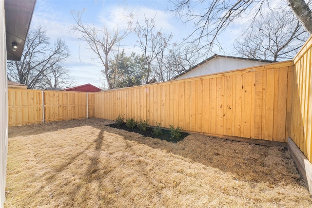 view of yard featuring a fenced backyard