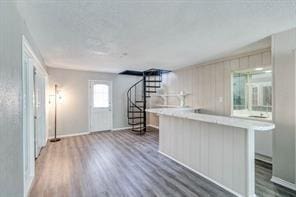 kitchen featuring dark wood-type flooring