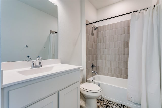 full bathroom with shower / bath combo, vanity, and toilet