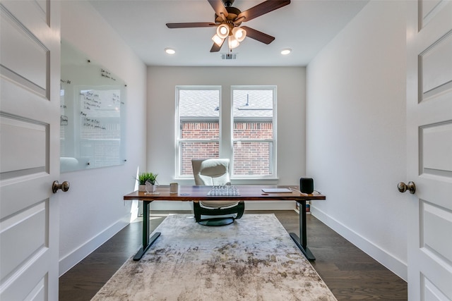 office featuring dark hardwood / wood-style floors and ceiling fan