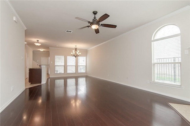 unfurnished room with crown molding, a wealth of natural light, and dark wood-type flooring