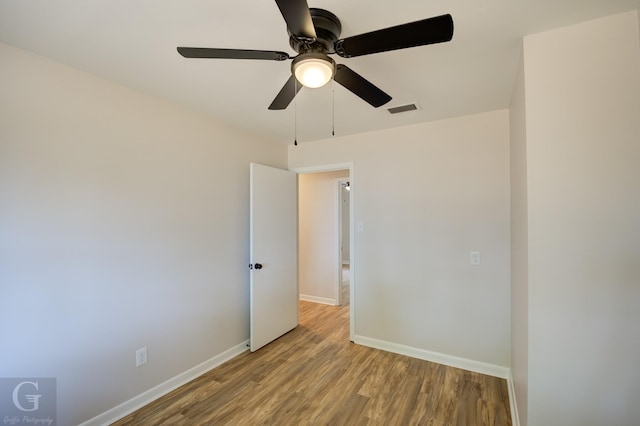 spare room featuring light hardwood / wood-style flooring