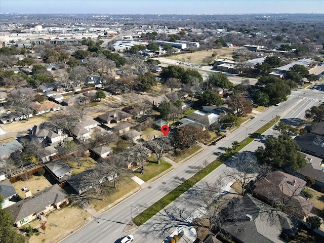 birds eye view of property with a residential view