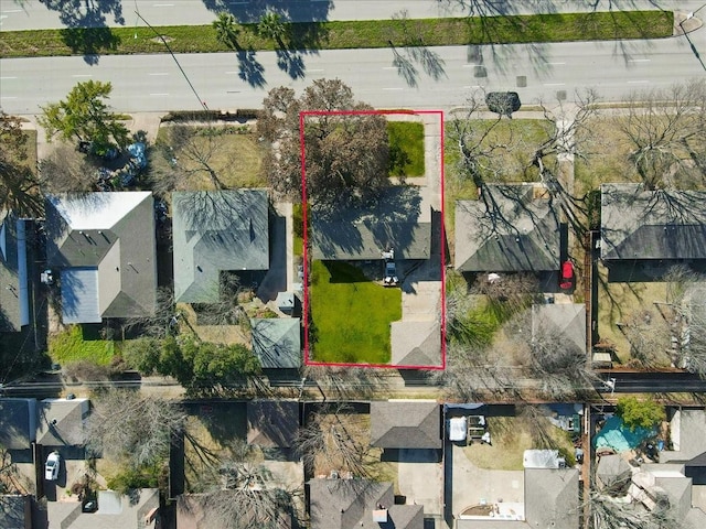 birds eye view of property with a residential view