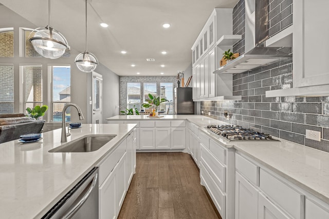 920 Windrock Ln, Prosper, TX 75078 - kitchen with a sink, stainless steel appliances, recessed lighting, dark wood-style flooring, and white cabinets