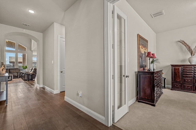920 Windrock Ln, Prosper, TX 75078 - corridor with arched walkways, baseboards, and wood finished floors
