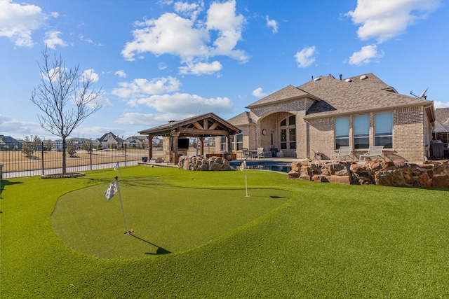 920 Windrock Ln, Prosper, TX 75078 - view of community with a putting area, fence, a patio, and a gazebo