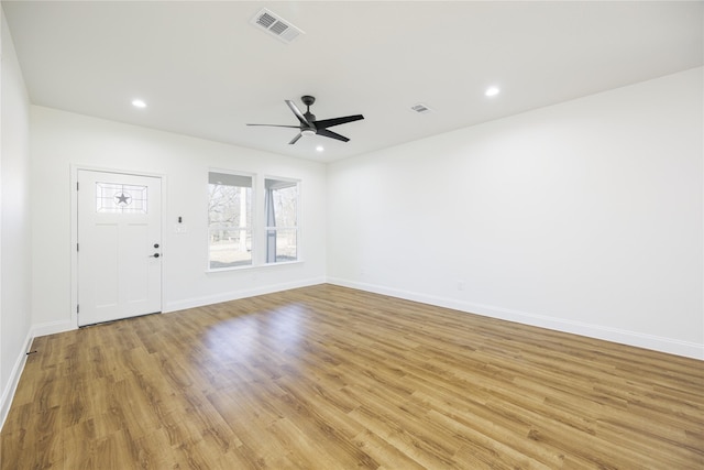 interior space with ceiling fan and light wood-type flooring