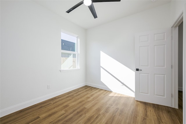 empty room featuring light hardwood / wood-style floors and ceiling fan