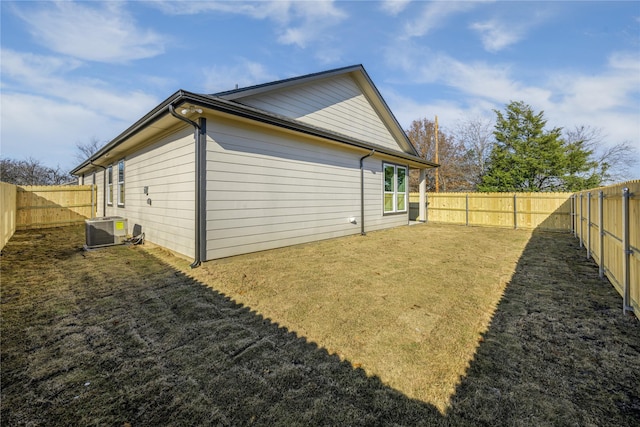 view of side of property featuring central AC