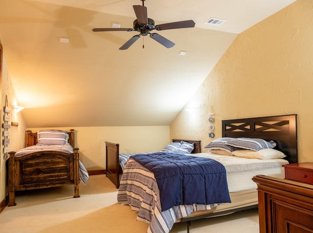 bedroom with lofted ceiling, light colored carpet, and ceiling fan