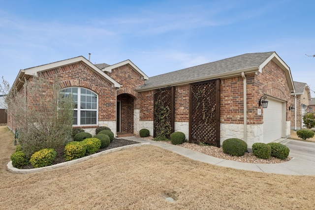 view of front of home with a garage