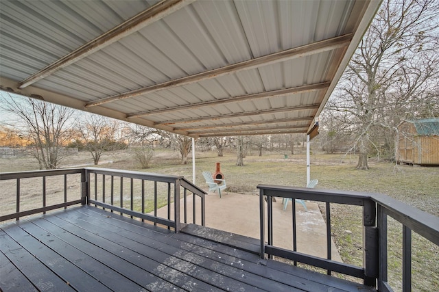 wooden deck with a yard