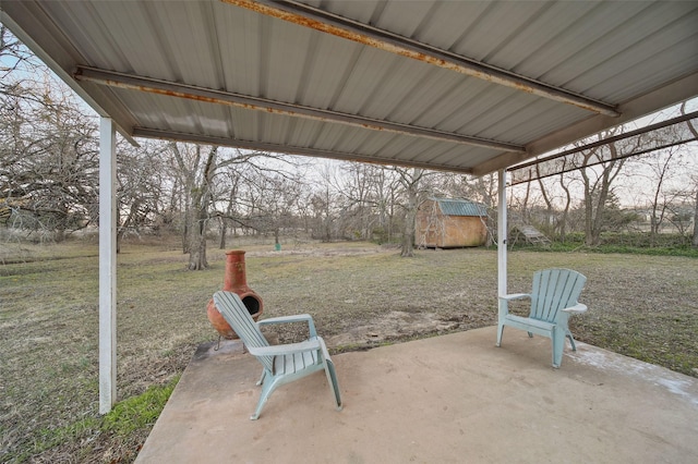 view of patio / terrace featuring a storage shed