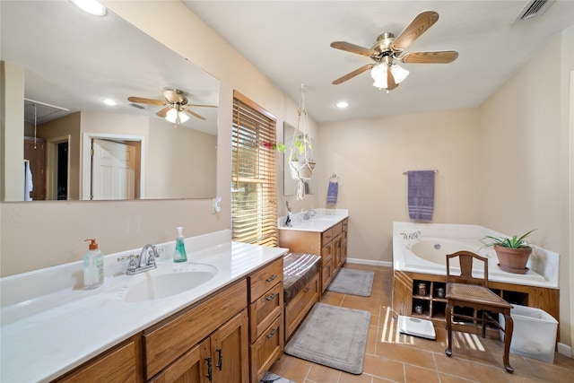 bathroom with vanity, tile patterned floors, and ceiling fan