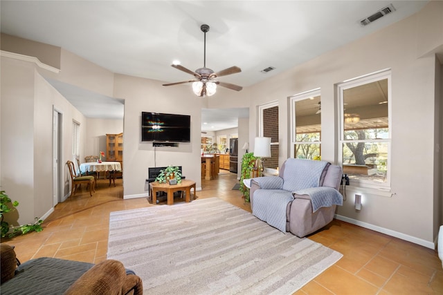 living room with ceiling fan