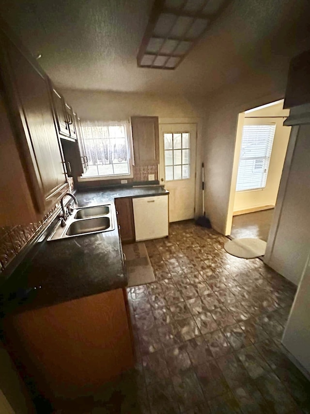 kitchen featuring dishwasher and sink