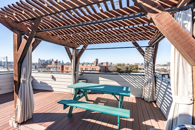 wooden deck featuring a pergola